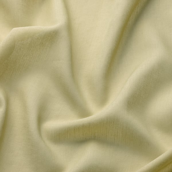 Soft, sheer olive-green curtain fabric made from recycled polyester, elegantly draped, offering light privacy.