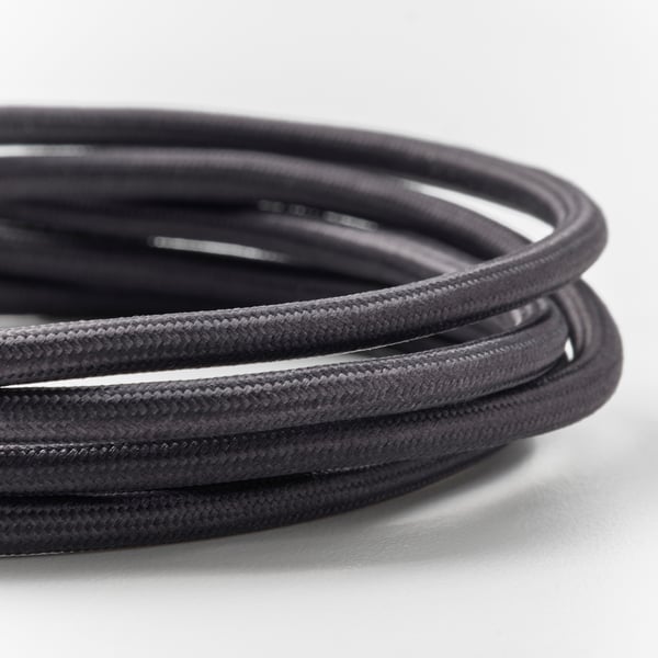Black usb-c cable, rolled, durable textile, flexible.