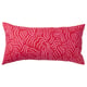A SANDMOTT rectangle cushion in vibrant red with pink patterns, featuring a scandinavian design. Its made from 100% cotton and polyester filling.