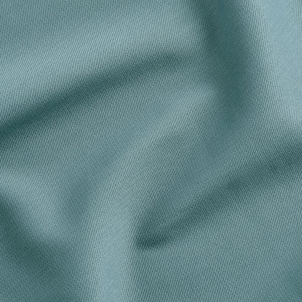 Close-up of textured fabric, likely an apron with hanging loop detail. Shows material blend of polyester and cotton for durability and comfort.