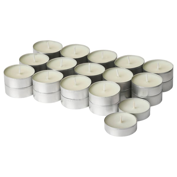 Collection of white tealight candles in silver holders, arranged in clusters.