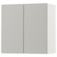 A white SMÅSTAD wall cabinet with two closed doors. The cabinet is rectangular and made of recycled materials. It has a sleek, modern design.