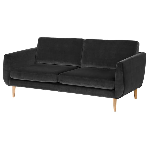 A SMEDSTORP grey velvet sofa in modern retro style, featuring soft curves, cushioned seats, and wooden legs.