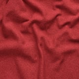 Close-up of rich, textured, red fabric with subtle melange effect, showcasing its soft and high-quality appearance.