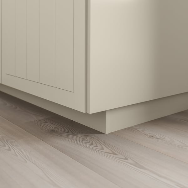 White kitchen cabinet plinth covering floor gap, part of STENSUND series.
