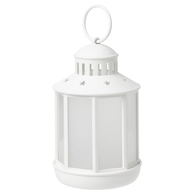 White STRÅLA lantern, cylindrical with star cutouts, hanging loop top.