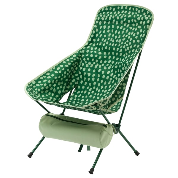 STRANDÖN green portable chair with dot pattern, foldable, sturdy metal frame, attached carrying case.
