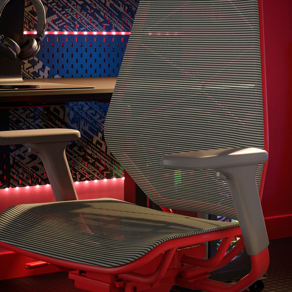 Red and grey gamer chair with mesh back, headphone holder, and rgb light strips.