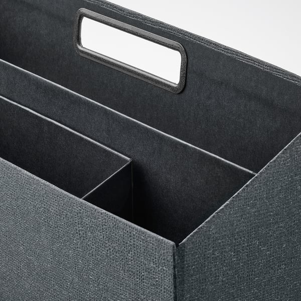 Black storage bin with cutout handle, sturdy and organised.