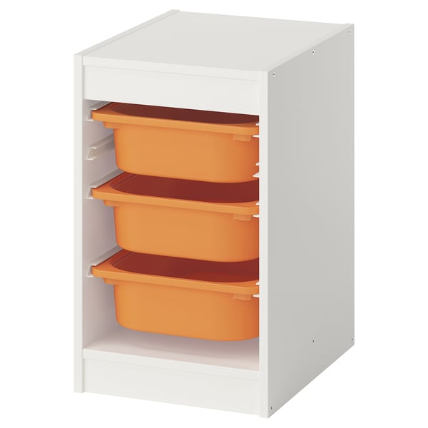 White TROFAST storage with 3 orange bins, open shelving for kids.