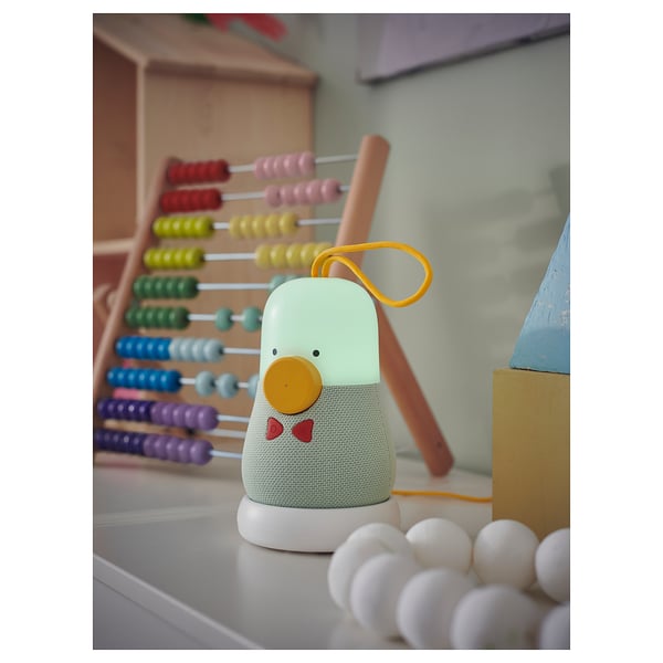 A playful penguin-shaped kids speaker lamp, light blue with grey, featuring colourful beads and lights.