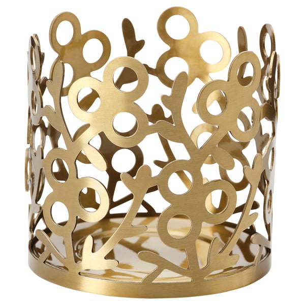 Golden metal cylindrical candle holder with intricate floral cutouts. Elegant, decorative design. Ideal for tealights.