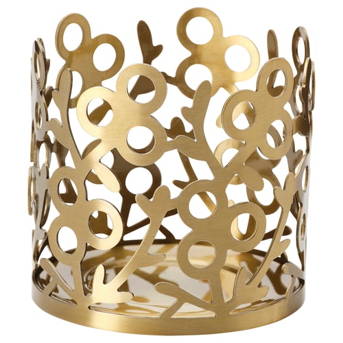 Golden metal cylindrical candle holder with intricate floral cutouts. Elegant, decorative design. Ideal for tealights.