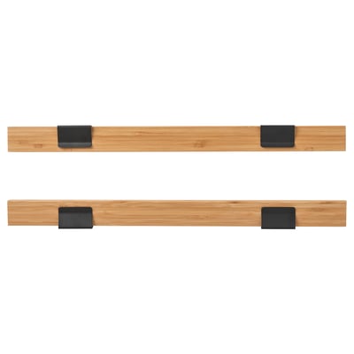 Two light brown bamboo poster hangers with black clips. Simple and decorative, perfect for displaying pictures.