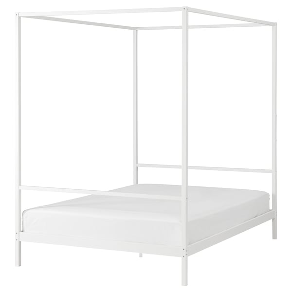VITARNA white metal four-poster bed, sleek & modern, ideal for small rooms, with sturdy frame & storage space.