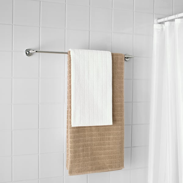 Modern towel rack with 2 folded towels, chrome finish for durability and easy access.