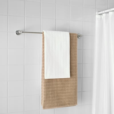 Modern towel rack with 2 folded towels, chrome finish for durability and easy access.