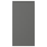 A VOXTORP cabinet door in dark grey with minimalist design and integrated handles.