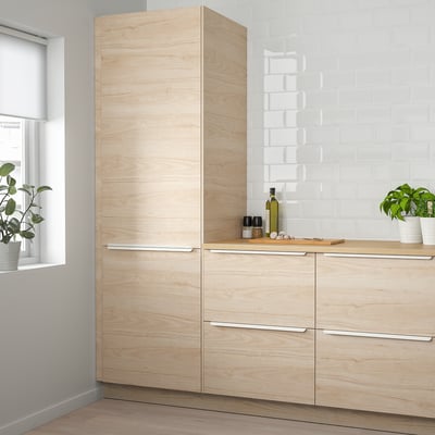 Light ash ASKERSUND cabinet near window, tall modern design.