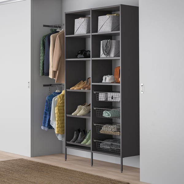Modern black closet organiser with shelves, hanging area, shoe racks, corner fit.
