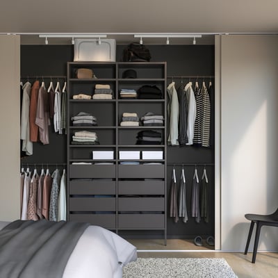 Organised closet AURDAL with shelves and hanging rails.