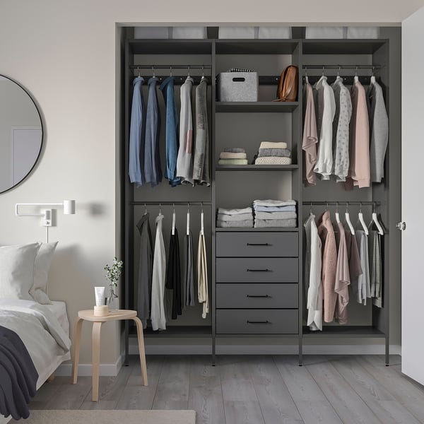 Modern grey AURDAL closet organiser with clothes and shelves. Drawers and a hanging rod, fitting neatly in bedroom space. Valuation.