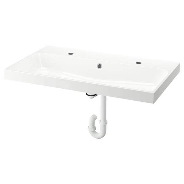A BACKSJÖN white marble sink with sleek design, modern look, and integrated marble basin, suitable for wash-stands.