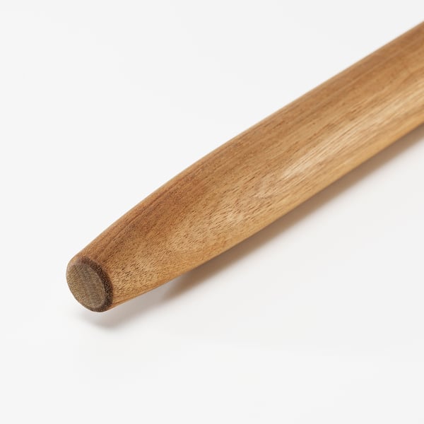 Smooth wooden rolling pin, crafted from polished acacia wood, shown in close-up, highlighting its natural finish and robust construction.