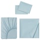 Three light blue bed sheets displayed: fitted sheet with elastic, flat sheet, and a pillowcase, all soft and light blue.