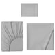 Three grey sheets displayed: fitted, flat, and pillowcase, neat and folded.