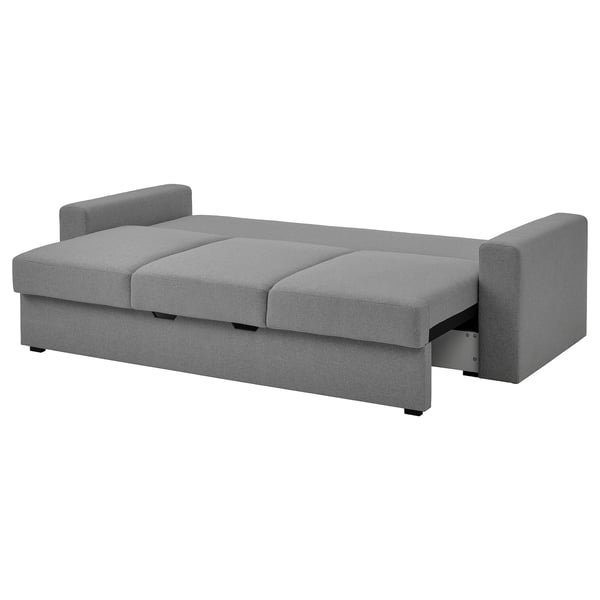 Modern grey sofa-bed with soft cushions and storage.
