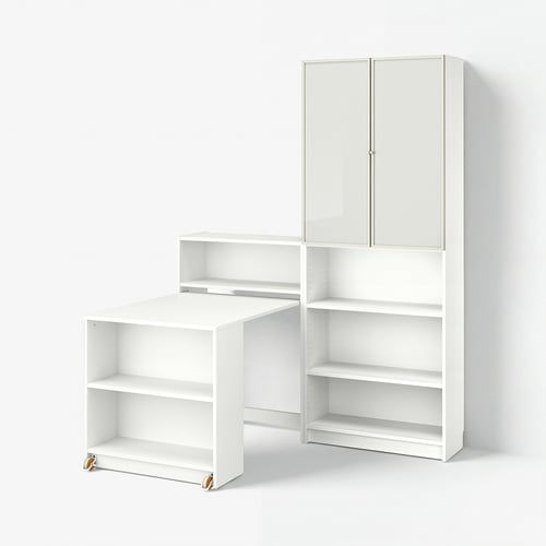 White BILLY bookcase with foldable table, combining open and closed storage, on casters.