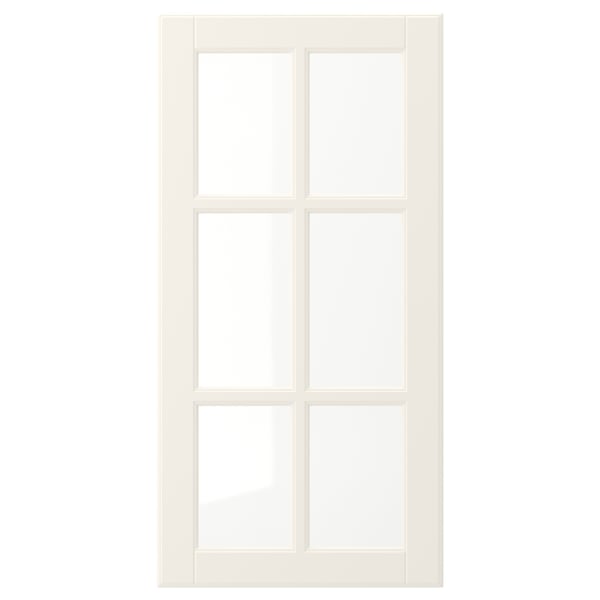 A BODBYN off-white kitchen cabinet door with a classic, bevelled design, featuring four square glass panels in a smooth, lacquered frame.