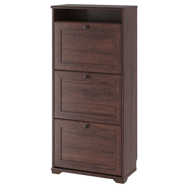 BRUSALI tall brown wooden shoe cabinet with three compartments and dark handles.