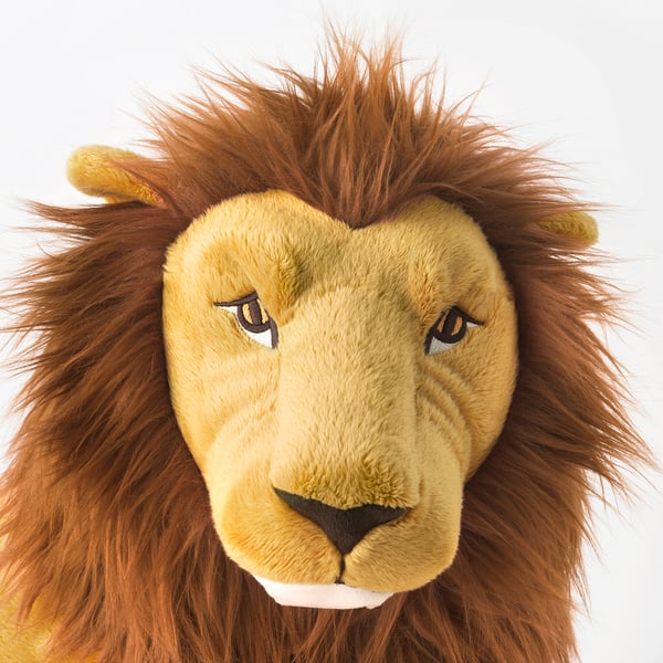 Lion cuddly toy with detailed stitching and realistic mane, high-quality materials.
