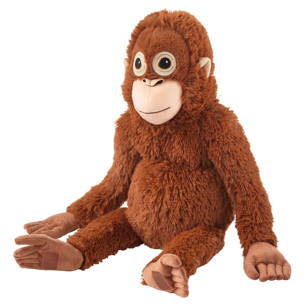 Brown stuffed toy monkey with large eyes and touch-and-close fasteners on hands and feet.