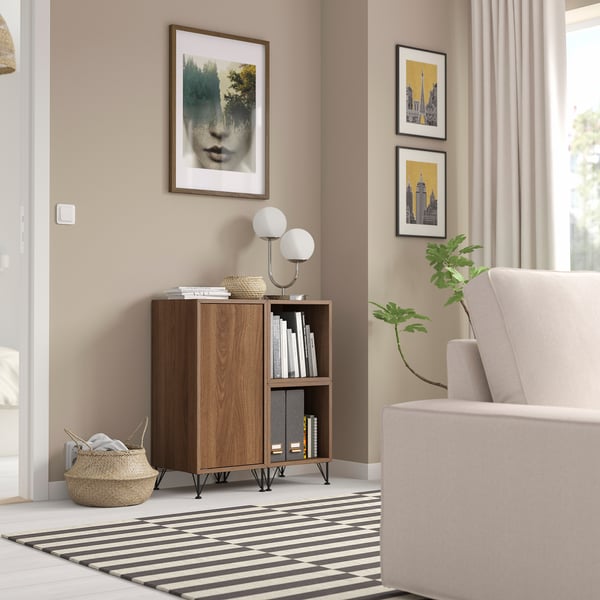 Modern living room with EKET storage, light brown, mixed materials, open shelves.