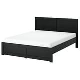 Black FÅGELFJÄLLET bed with sleek design, featuring crafted details and sturdy structure.