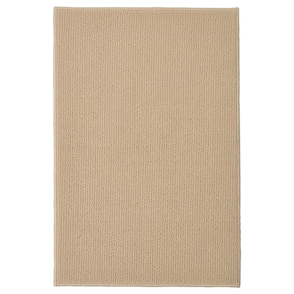 FINTSEN beige bath mat, rectangular, textured jute-like design, recycled polyester.
