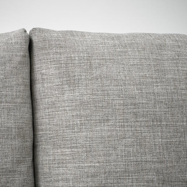 A section of a grey fabric sofa, highlighting its soft texture and modern design, suggesting comfort and durability.
