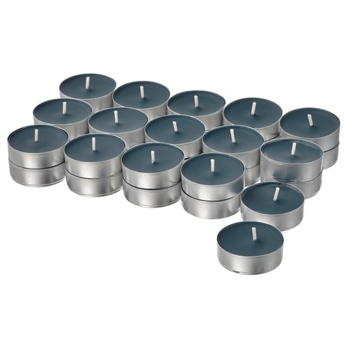 A collection of tealight candles in blue hue, housed in metallic silver cups, arranged in a group.