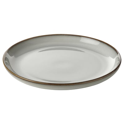 A round, sandy-colored side plate from the GLADELIG series. Made of glazed stoneware, its simple yet decorative design adds a classic touch.