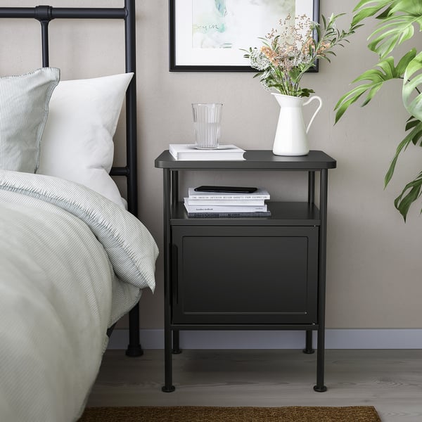GRÅFJÄLLET black bedside table; compact, holds books, vase, glass; metal and particleboard; industrial design.