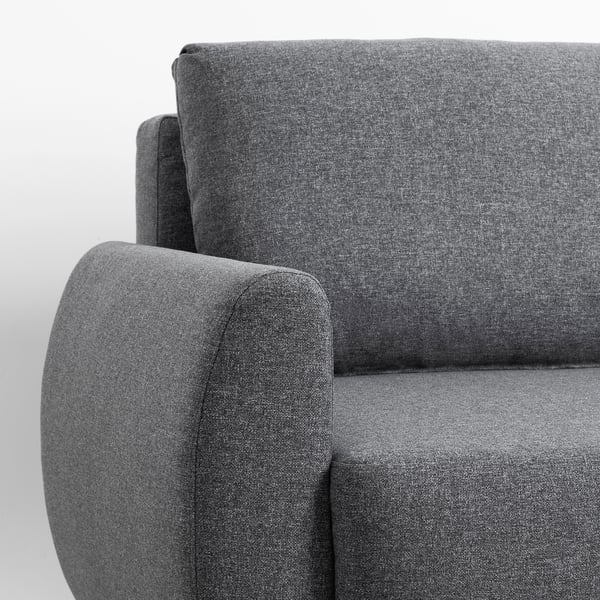 Elegant, modern sofa with sleek, rounded armrests and plush cushions, showcasing high-quality upholstery and sturdy construction.