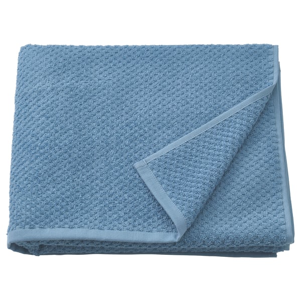 Folded blue GULVIAL towel, soft cotton, rectangle with textured surface.