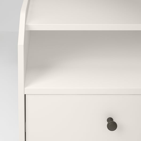 Minimalist white bedside table with smooth finish and sleek handle.