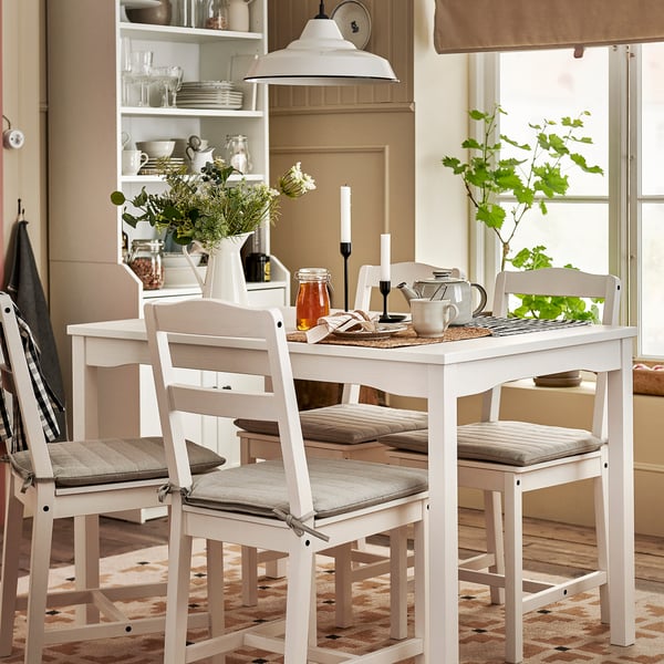 HAUGA white dining table with flowers & tea