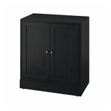 A black HAVSTA wooden cabinet with two doors, simple design, and a sturdy structure made from solid pine.