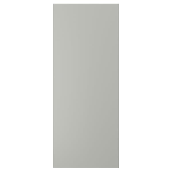 A light grey rectangular HAVSTORP kitchen cabinet door made of acrylic paint and fibreboard with a smooth finish.