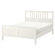 HEMNES white bed: solid pine, rectangular, slatted headboard, clean design.